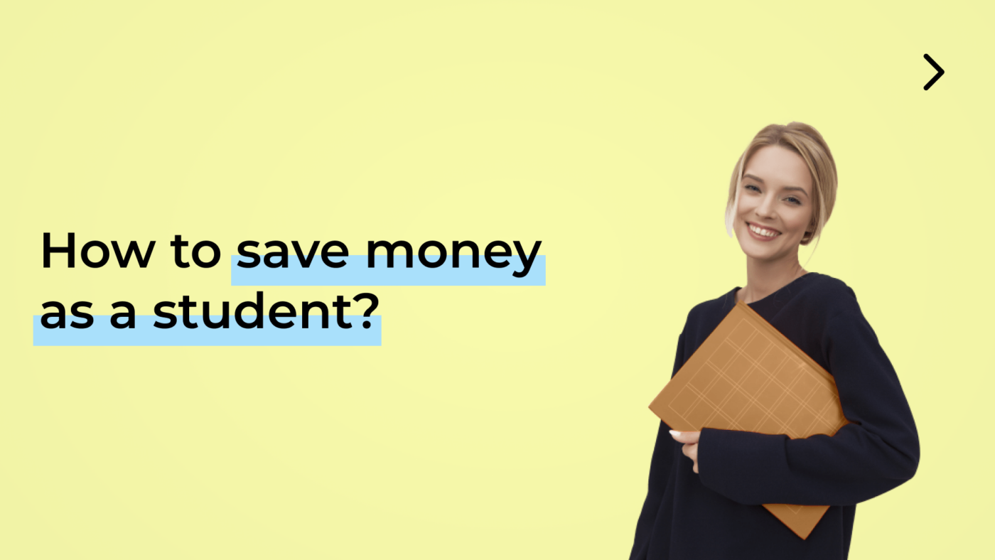 student holding a notebook and smiling as she learns how to save money as a student